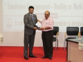 Dr. Rajesh Pandey receiving memento from the Founder member of ISTD Silvassa Chapter